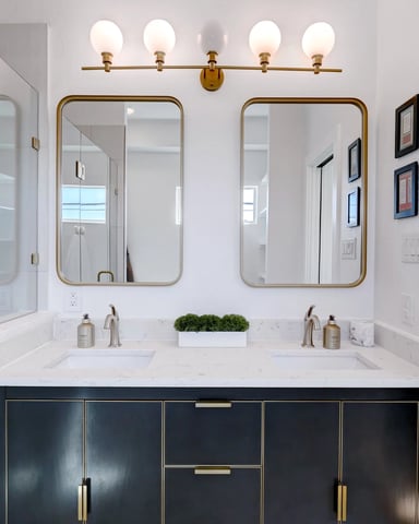 Urban townhouse bathroom with double vanity and modern fixtures