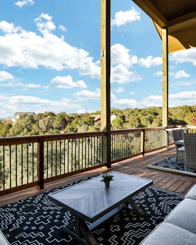 Wooden deck overlooking Canyon Lake with hill views