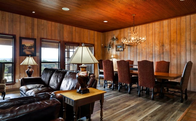 Real estate professional meeting with a client at a desk